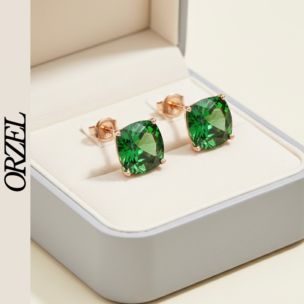 Boucles d’oreilles carrées en argent 925 avec pierre émeraude.