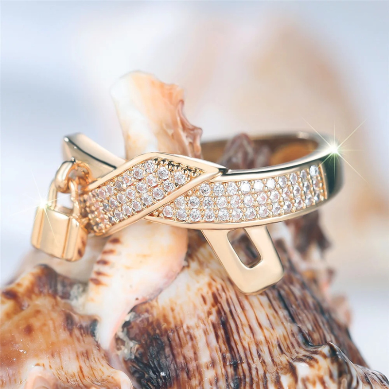 Bague OERZL plaquée or – Zircon blanc & promesse d’amour.