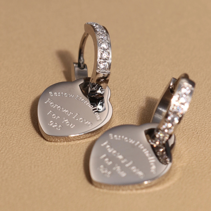 Boucles ORZEL cœur – Acier inoxydable & pendentif zircon.