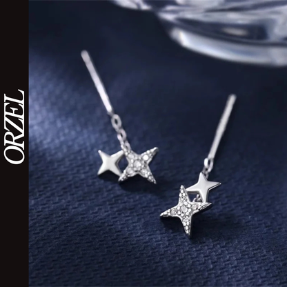 Boucles d’oreilles femme – Pompon et étoile en argent 925.