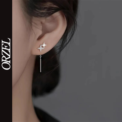 Boucles d’oreilles femme – Pompon et étoile en argent 925.