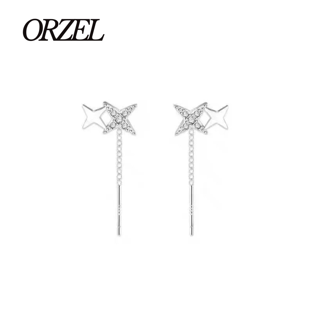 Boucles d’oreilles femme – Pompon et étoile en argent 925.