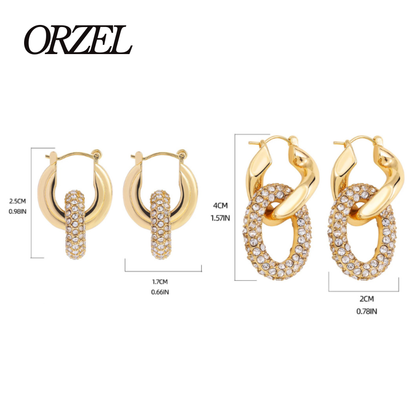 Boucles d’oreilles torsadées – style punk chic avec zircons brillants.