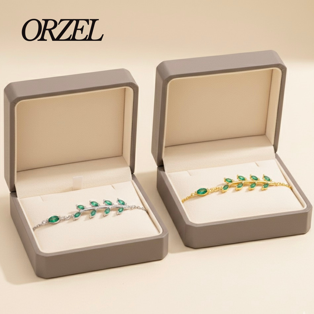 Bracelet chaîne ajustable en argent 925 avec motif feuille verte et zircone.