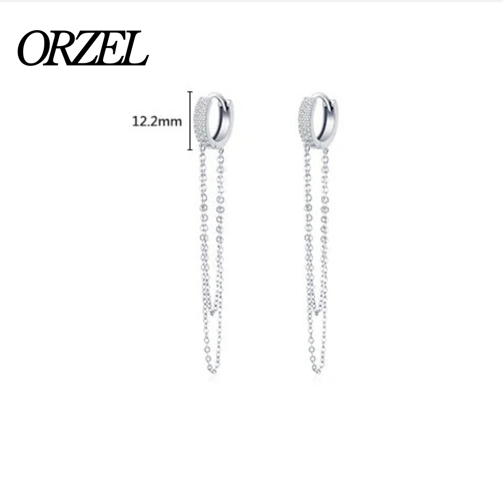 Boucles d’oreilles longues à pampilles en argent 925 avec zircone scintillante.
