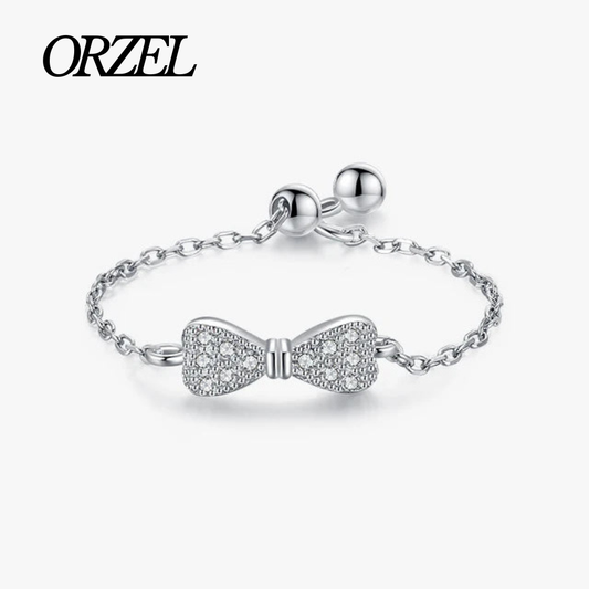 Bague nœud papillon réglable en argent 925 avec zircones pavées.