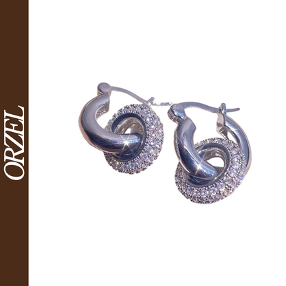 Boucles d’oreilles ORZEL cercle – Micro-incrustation CZ, port bidirectionnel.