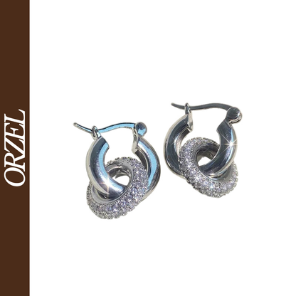 Boucles d’oreilles ORZEL cercle – Micro-incrustation CZ, port bidirectionnel.