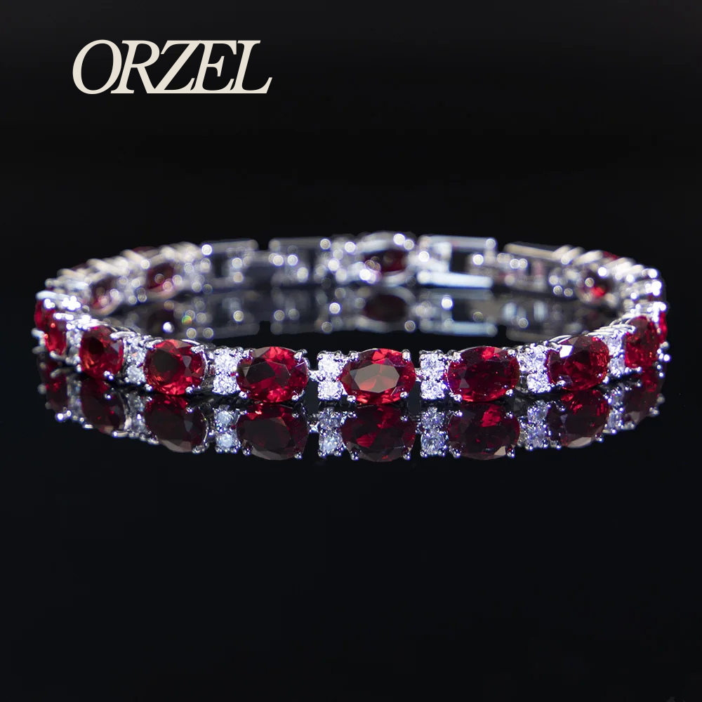 Bracelet porte-bonheur en argent 925 avec topaze colorée.