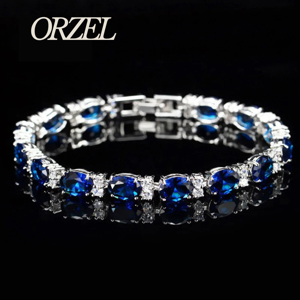 Bracelet porte-bonheur en argent 925 avec topaze colorée.