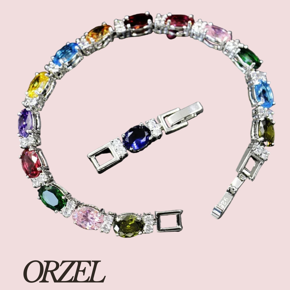 Bracelet porte-bonheur en argent 925 avec topaze colorée.