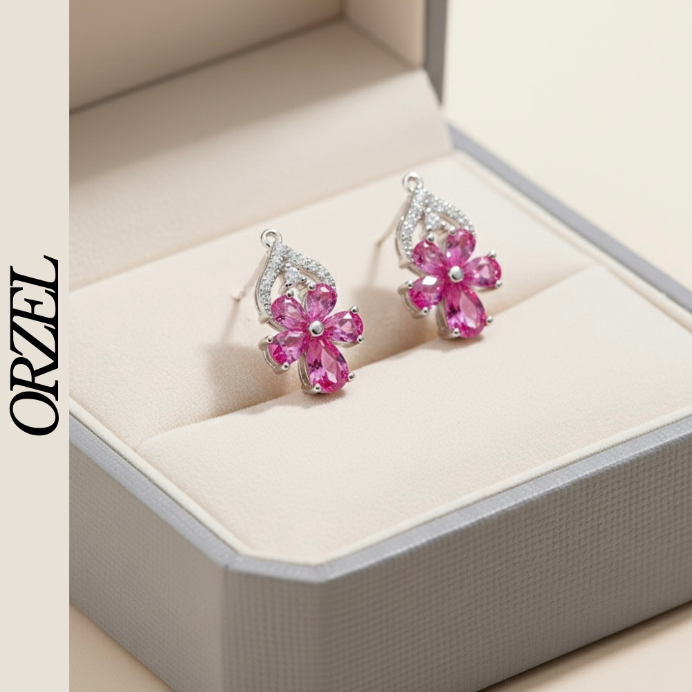 Boucles d’oreilles pendantes papillon en argent 925 avec pierres précieuses.