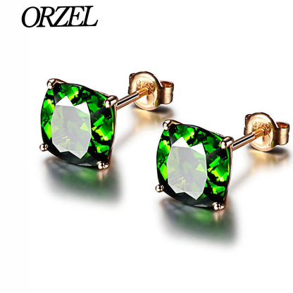 Boucles d’oreilles carrées en argent 925 avec pierre émeraude.