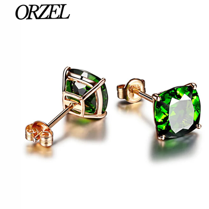 Boucles d’oreilles carrées en argent 925 avec pierre émeraude.