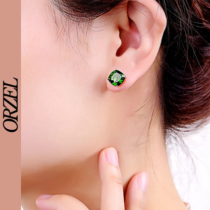 Boucles d’oreilles carrées en argent 925 avec pierre émeraude.