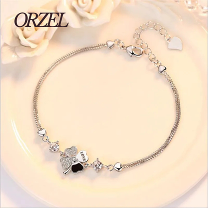 Bracelet femme – Argent Sterling 925 plaqué or rose avec trèfle en cristal.