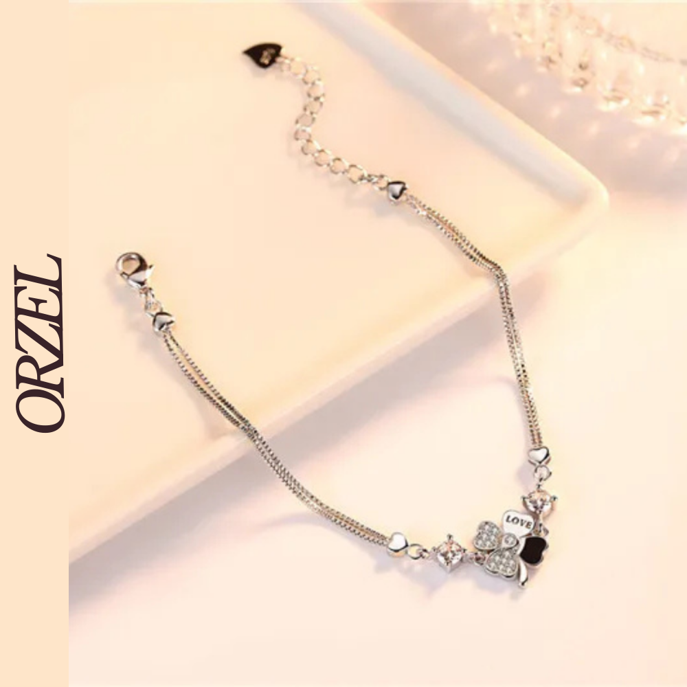 Bracelet femme – Argent Sterling 925 plaqué or rose avec trèfle en cristal.