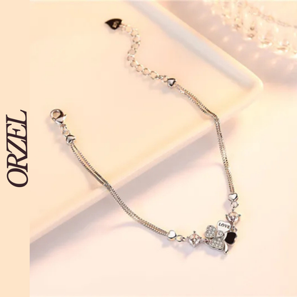 Bracelet femme – Argent Sterling 925 plaqué or rose avec trèfle en cristal.