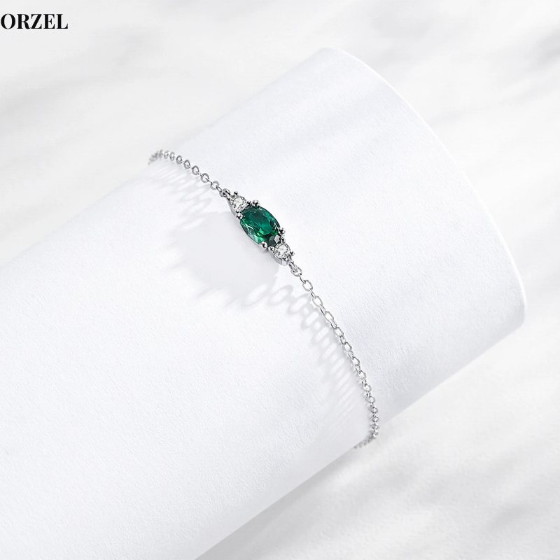 Bracelet femme en argent sterling 925 – Chaîne ovale avec zircon vert et quartz fumé.