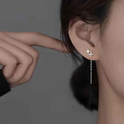 Boucles d’oreilles femme – Pompon et étoile en argent 925.