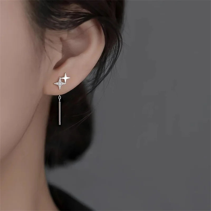 Boucles d’oreilles femme – Pompon et étoile en argent 925.