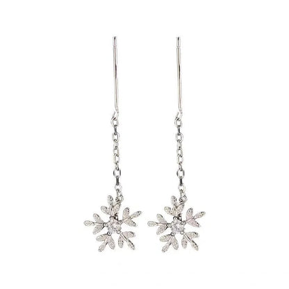 Boucles d’oreilles femme en argent 925 – Flocon de neige avec pompon long.