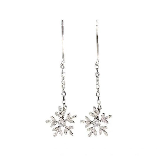 Boucles d’oreilles femme en argent 925 – Flocon de neige avec pompon long.